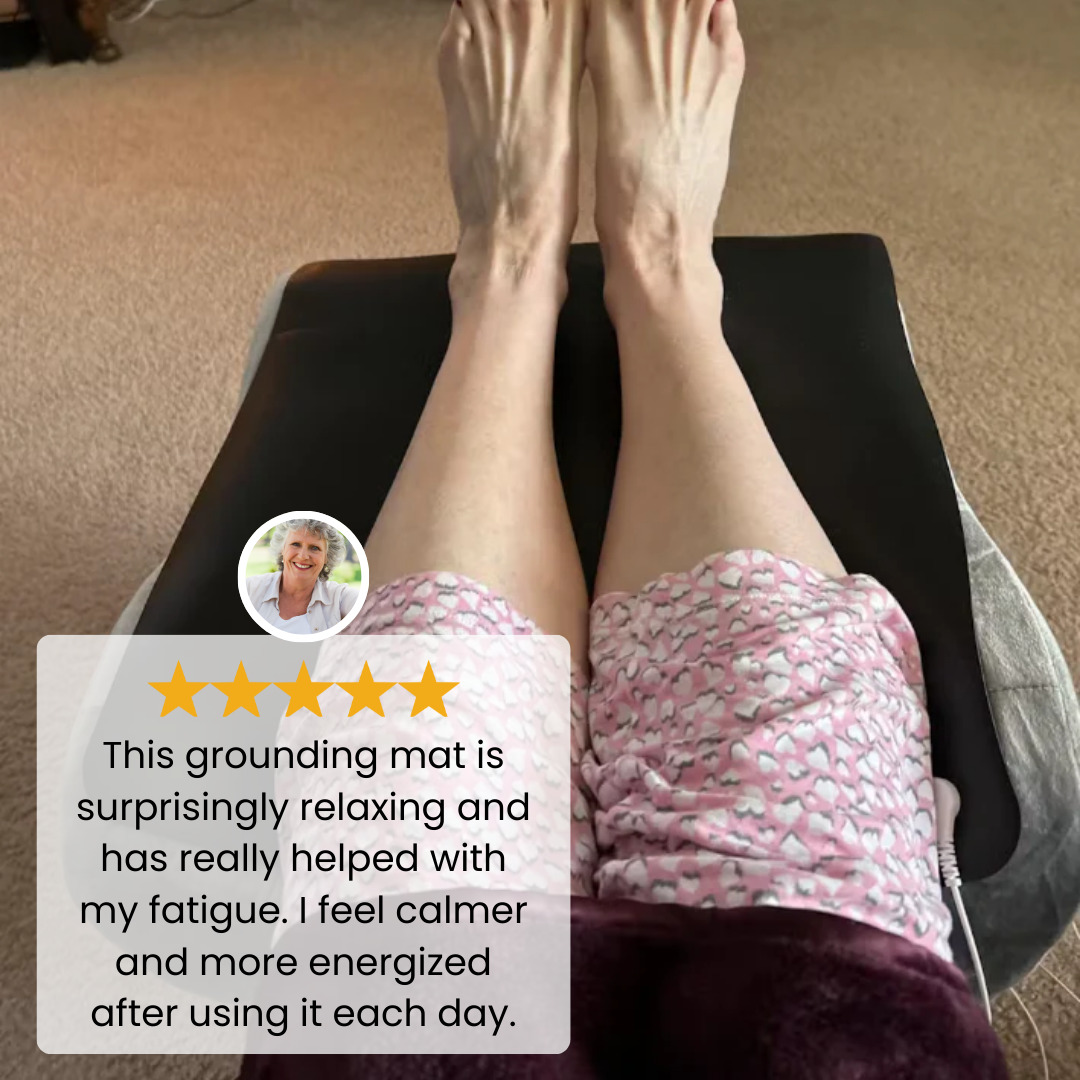 Person resting their legs on a grounding mat with a customer testimonial overlay and five star rating.